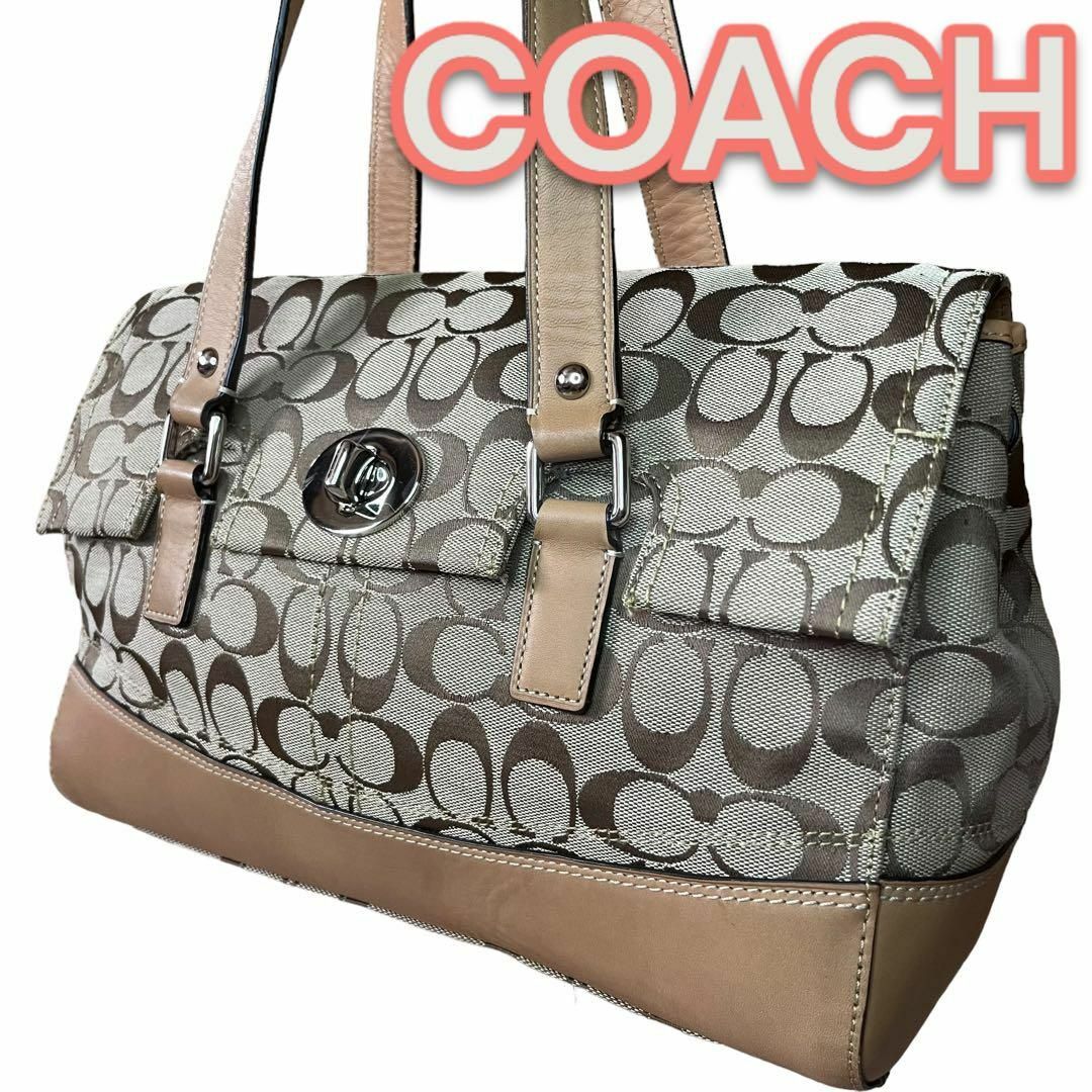 COACH(コーチ)の大人気ターンロック開閉　COACH　ハンドバッグ　シグネチャー　ブラウン レディースのバッグ(ハンドバッグ)の商品写真