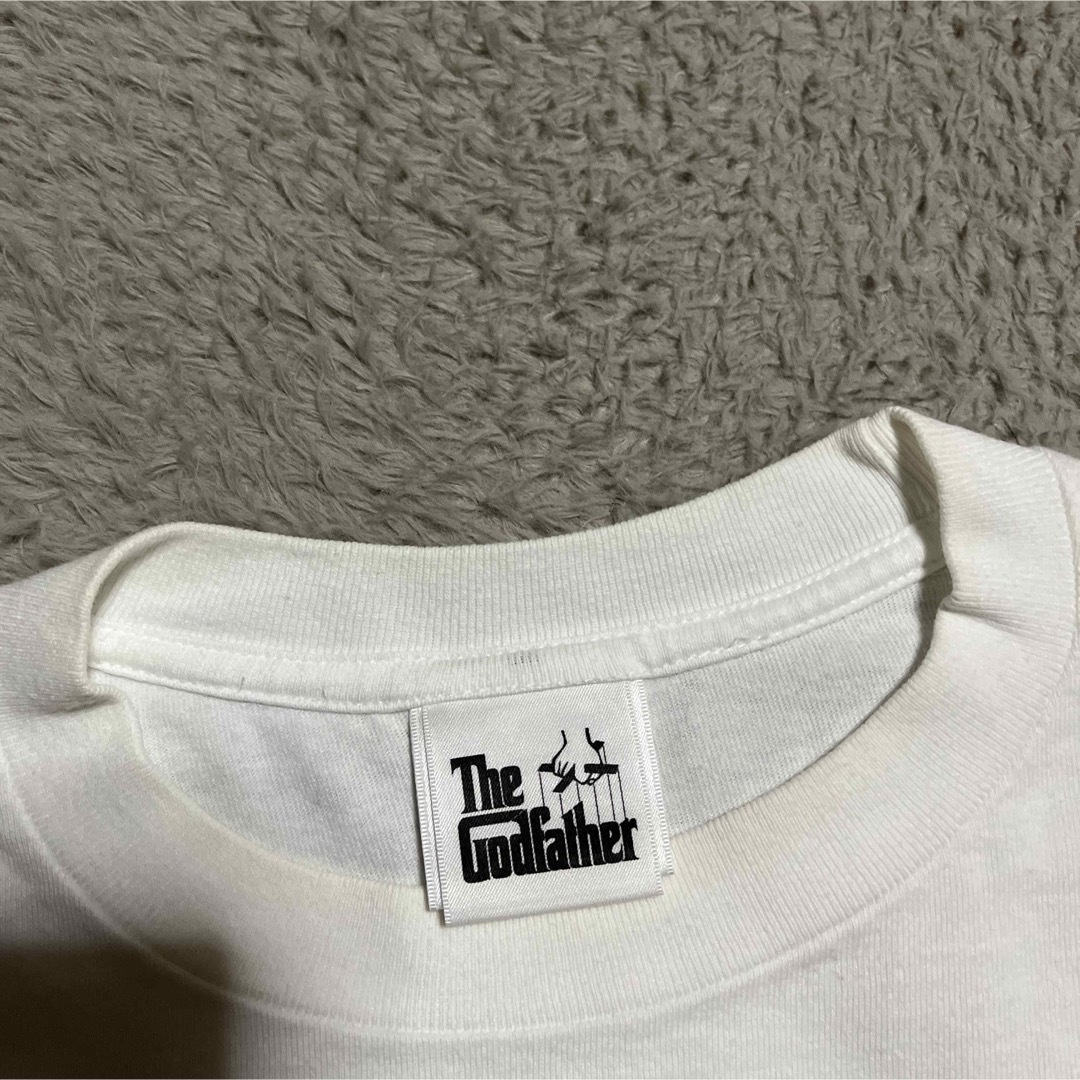 A BATHING APE(アベイシングエイプ)のAPE BAPE KAWS The Godfather チェック　tシャツ　L メンズのトップス(Tシャツ/カットソー(半袖/袖なし))の商品写真