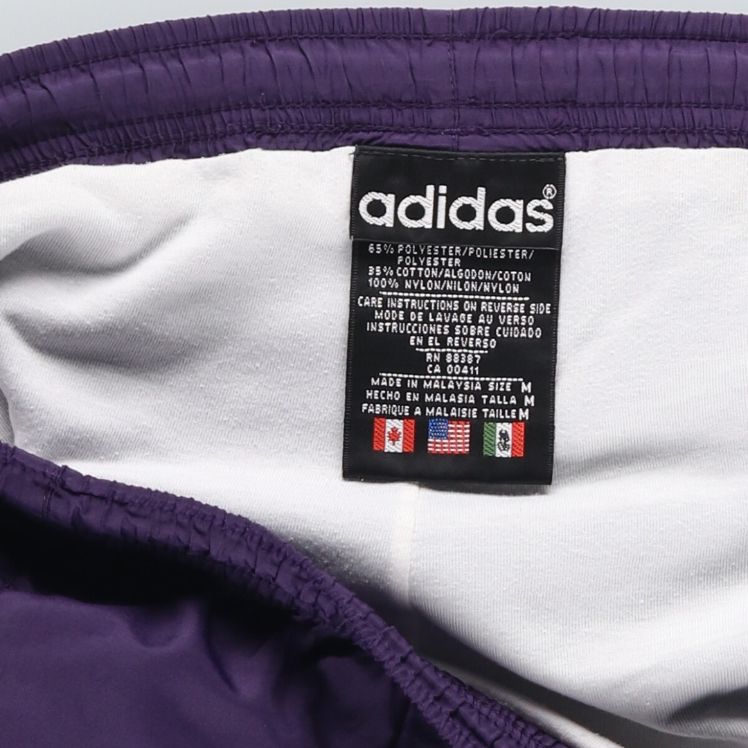 adidas(アディダス)の古着 90年代 アディダス adidas ウォームアップパンツ ナイロンパンツ シャカシャカパンツ メンズM ヴィンテージ /eaa438604 メンズのパンツ(その他)の商品写真