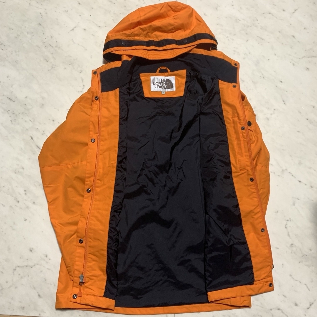 THE NORTH FACE(ザノースフェイス)のTHE NORTH FACE  マウンテンパーカー　オレンジ レディースのジャケット/アウター(その他)の商品写真