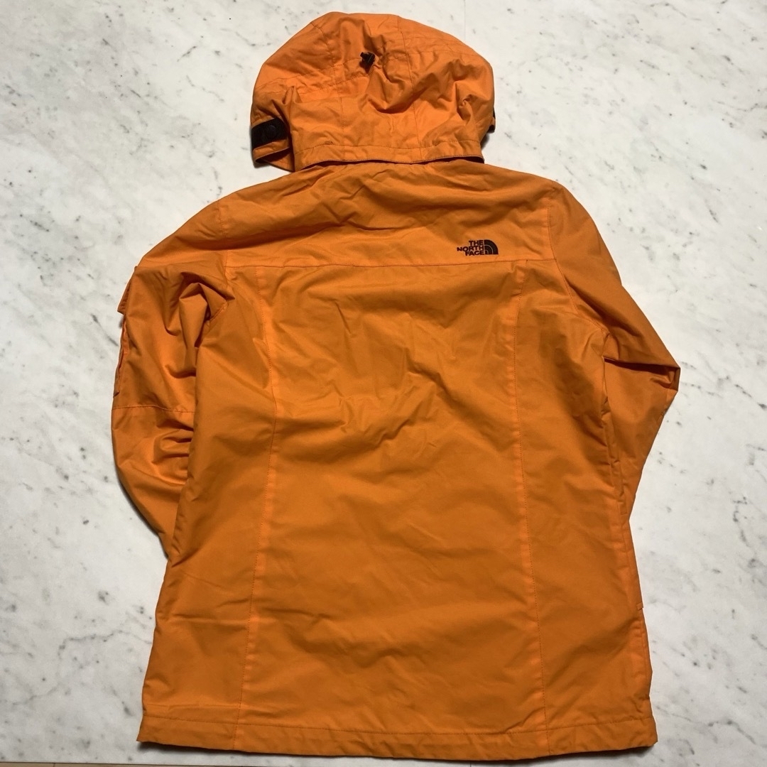 THE NORTH FACE(ザノースフェイス)のTHE NORTH FACE  マウンテンパーカー　オレンジ レディースのジャケット/アウター(その他)の商品写真