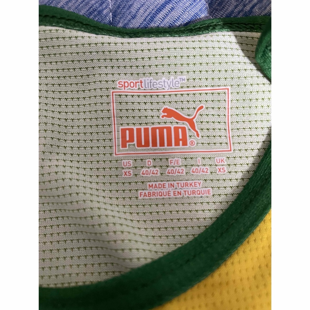 PUMA(プーマ)のプーマ　タンクトップ　美品　ジャマイカ　 ユニフォーム レディースのトップス(タンクトップ)の商品写真