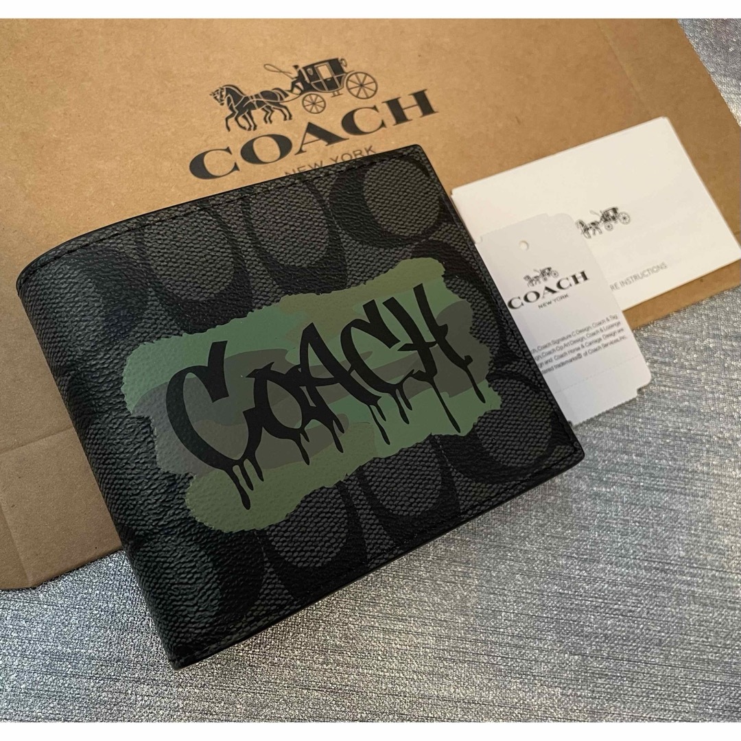 COACH(コーチ)のCOACH  コーチ　二つ折り　グラフィック　　配布　シグネチャー　未使用品 レディースのファッション小物(財布)の商品写真