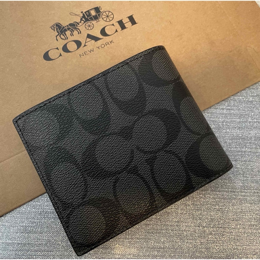 COACH(コーチ)のCOACH  コーチ　二つ折り　グラフィック　　配布　シグネチャー　未使用品 レディースのファッション小物(財布)の商品写真