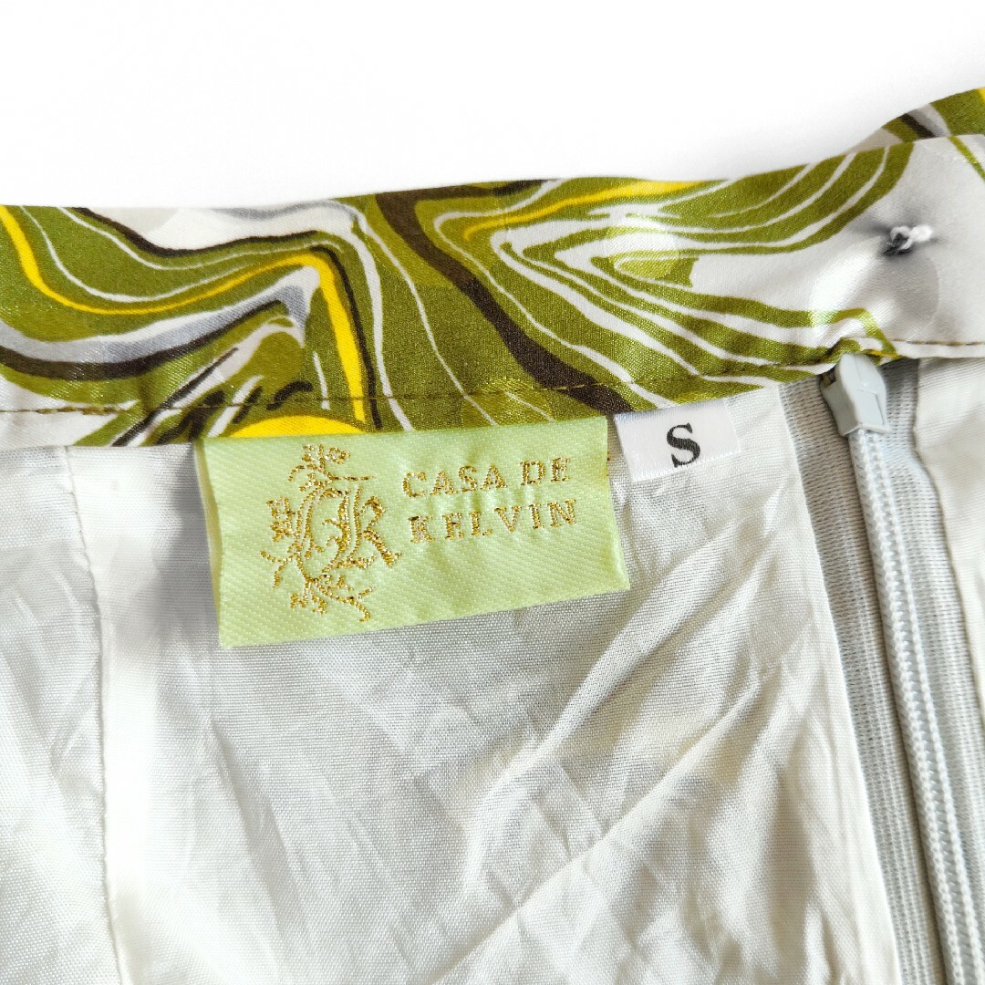 TOCCA(トッカ)の美品 フレアスカート 膝下丈 ボタニカル柄 インポート ホワイト 白 黄色 緑 レディースのスカート(ひざ丈スカート)の商品写真