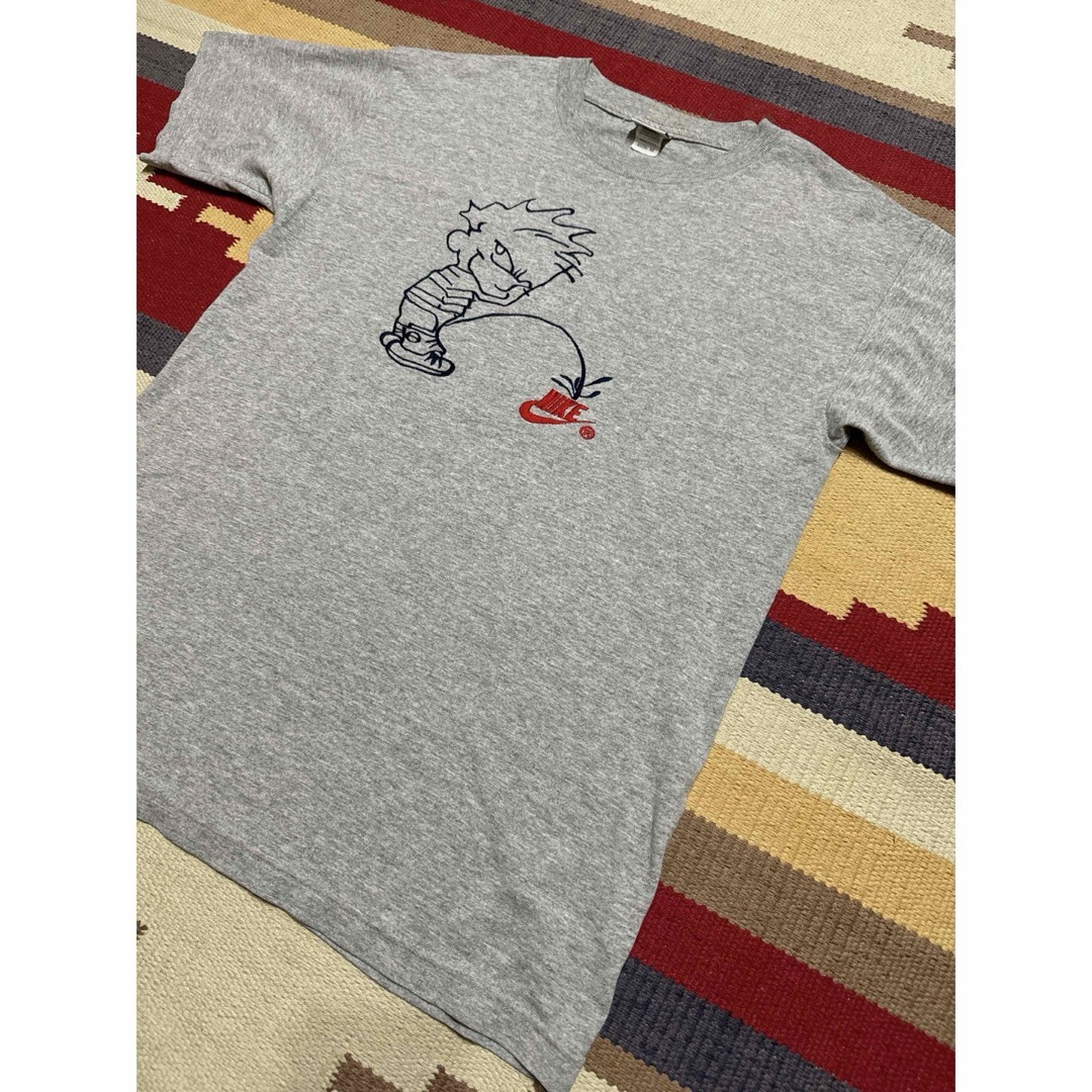 NIKE(ナイキ)の激レア 90s ナイキ Tシャツ 銀タグ 小便小僧 メンズのトップス(Tシャツ/カットソー(半袖/袖なし))の商品写真