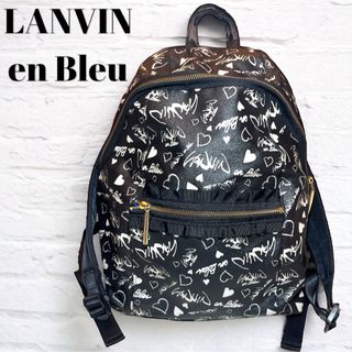 ランバンオンブルー(LANVIN en Bleu)のランバンオンブルー リュック ミシャル フリル PVC 手書きロゴ 黒 白(リュック/バックパック)