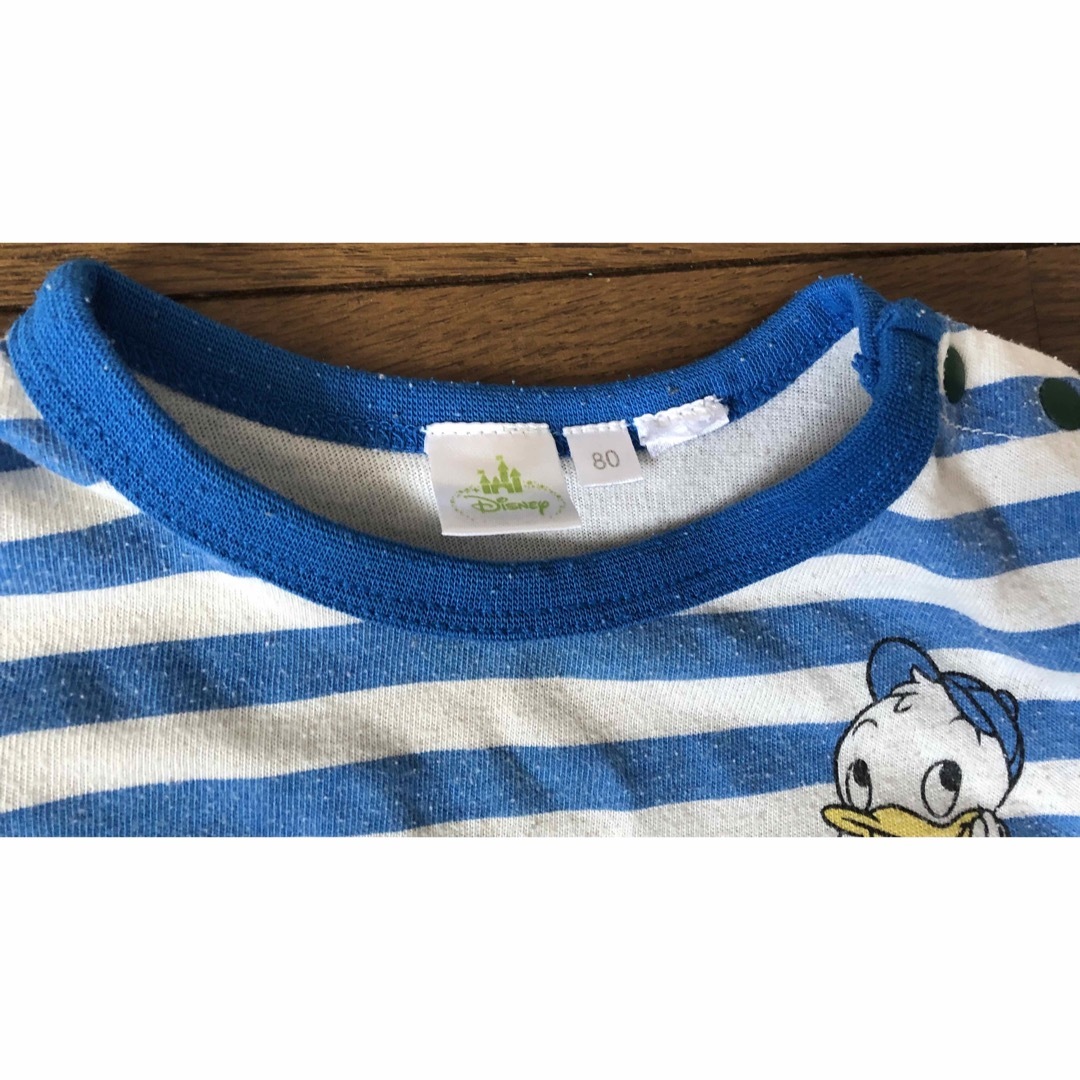 Disney(ディズニー)のTシャツ キッズ/ベビー/マタニティのベビー服(~85cm)(Ｔシャツ)の商品写真