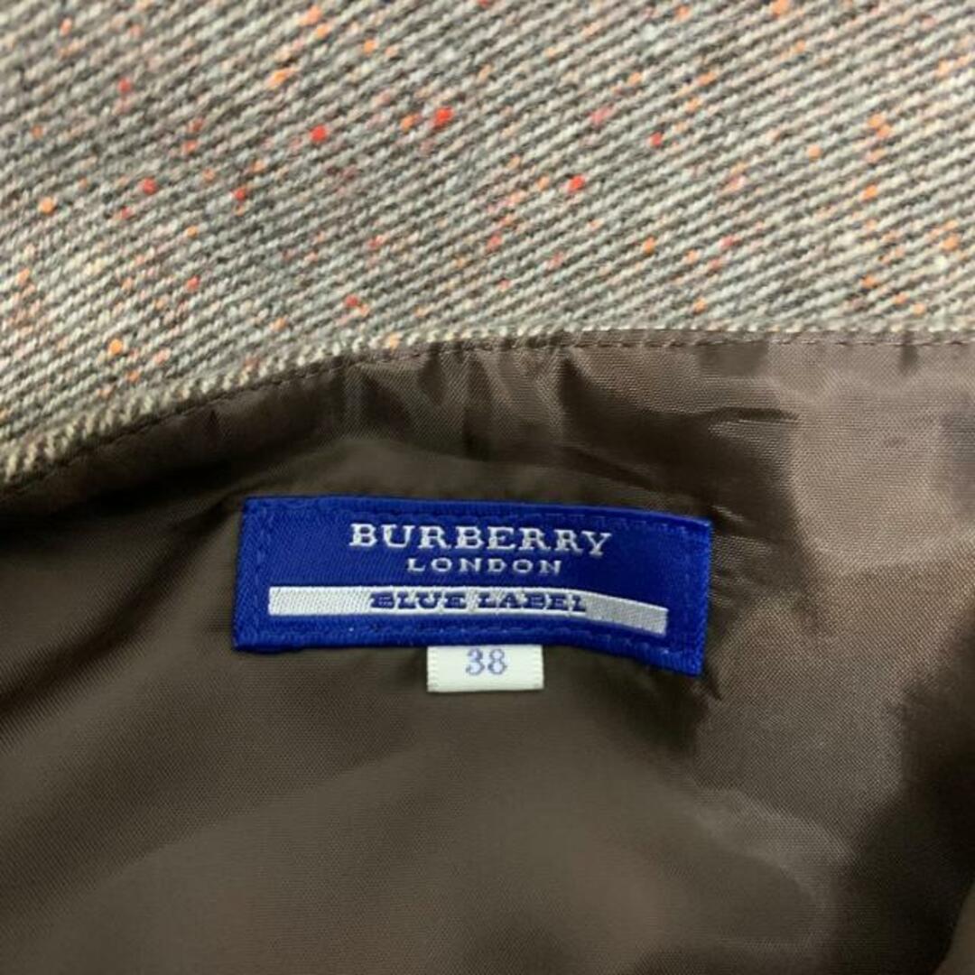 BURBERRY BLUE LABEL(バーバリーブルーレーベル)のBurberry Blue Label(バーバリーブルーレーベル) スカート サイズ38 M レディース美品  - ダークブラウン×ベージュ×オレンジ ひざ丈/プリーツ レディースのスカート(その他)の商品写真