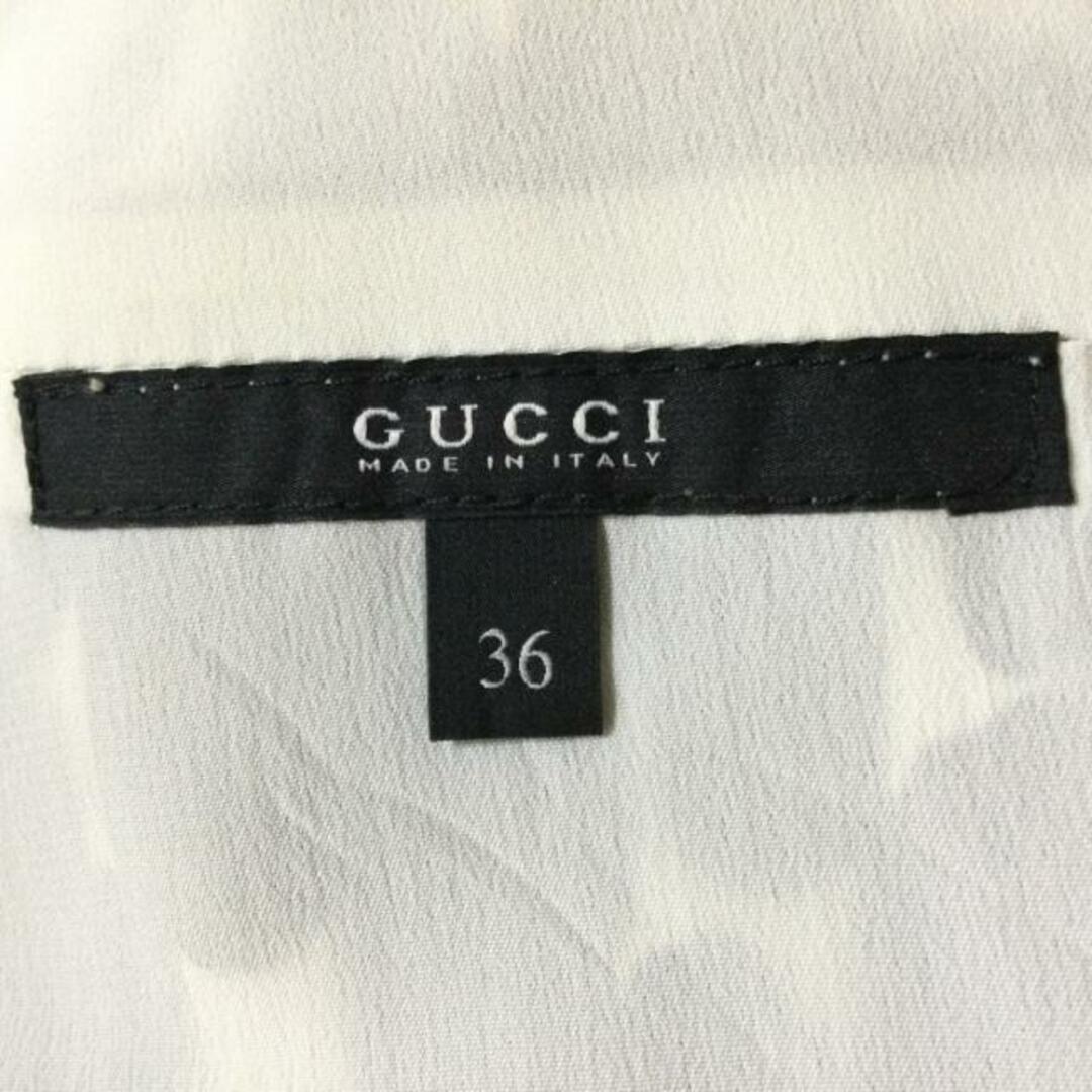 Gucci(グッチ)のGUCCI(グッチ) ワンピース サイズ36 S レディース - 188943 ZR211 黒×アイボリー×オレンジ クルーネック/ノースリーブ/ロング/シルク レディースのワンピース(その他)の商品写真