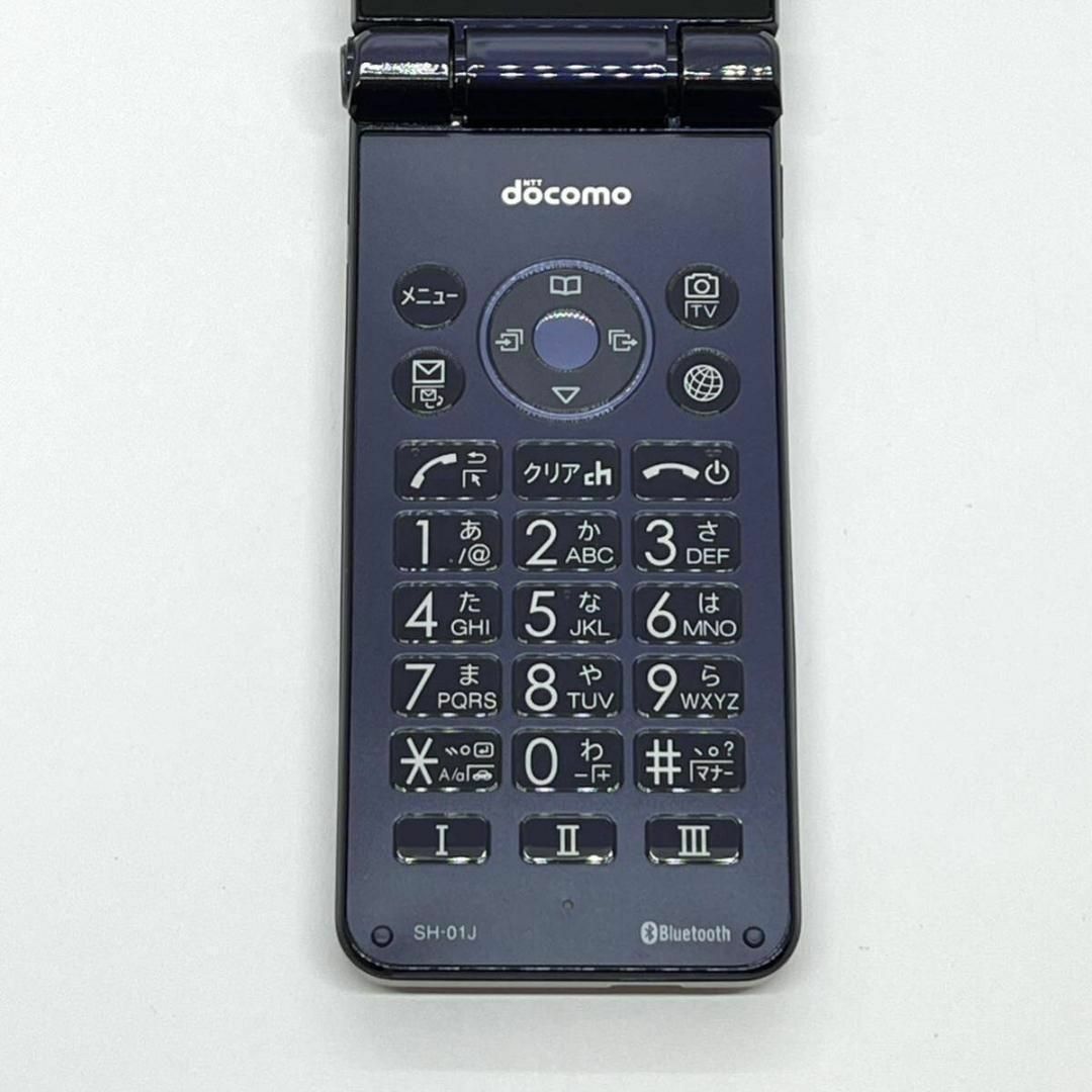 SHARP(シャープ)のAQUOSケータイ SH-01J ブルーブラック docomo SIMフリー㉛ スマホ/家電/カメラのスマートフォン/携帯電話(携帯電話本体)の商品写真