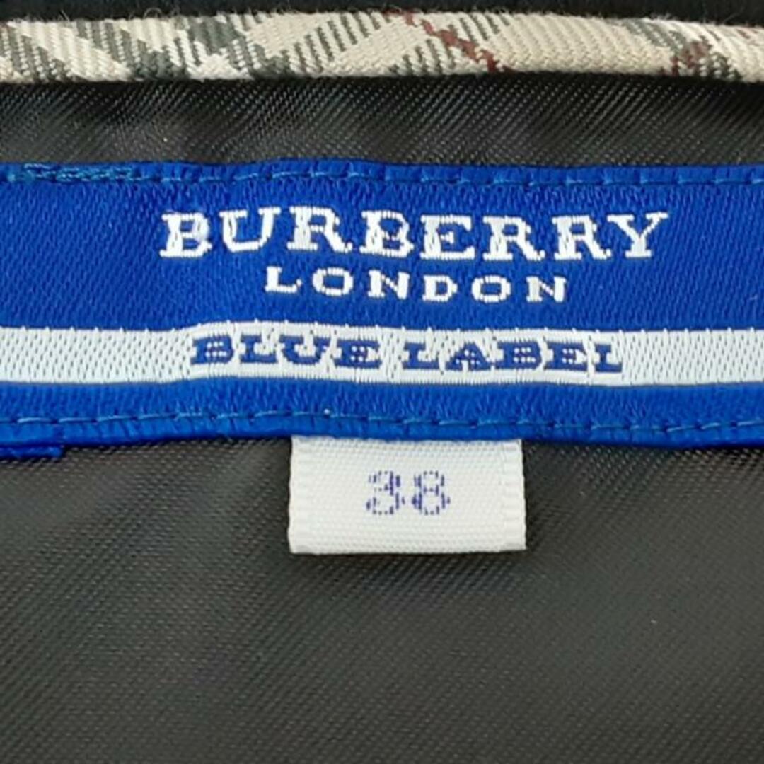 BURBERRY BLUE LABEL(バーバリーブルーレーベル)のBurberry Blue Label(バーバリーブルーレーベル) ワンピース サイズ38 M レディース美品  - 黒×ベージュ×マルチ 半袖/ミニ レディースのワンピース(その他)の商品写真