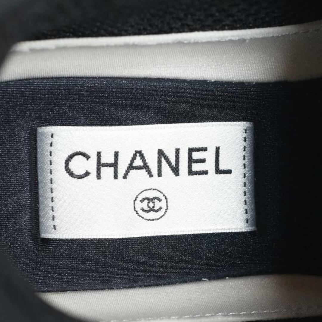 CHANEL(シャネル)のCHANEL(シャネル) スニーカー 38 レディース美品  - G38299 アイボリー×黒 ココマーク/インソール取外し可 化学繊維×スエード レディースの靴/シューズ(スニーカー)の商品写真