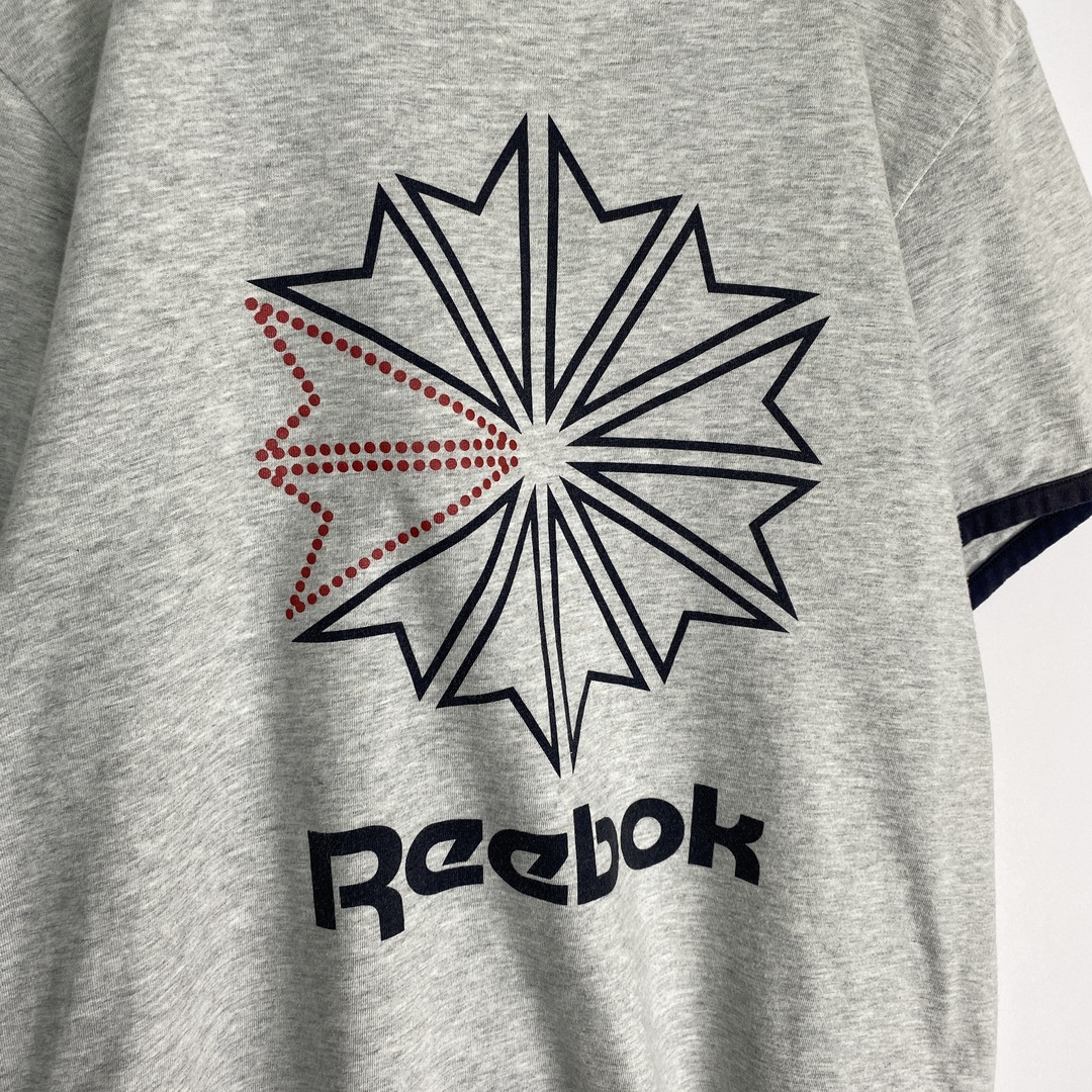 Reebok(リーボック)のリーボック　リンガーＴシャツ　ビッグロゴ　グレー　黒 メンズのトップス(Tシャツ/カットソー(半袖/袖なし))の商品写真