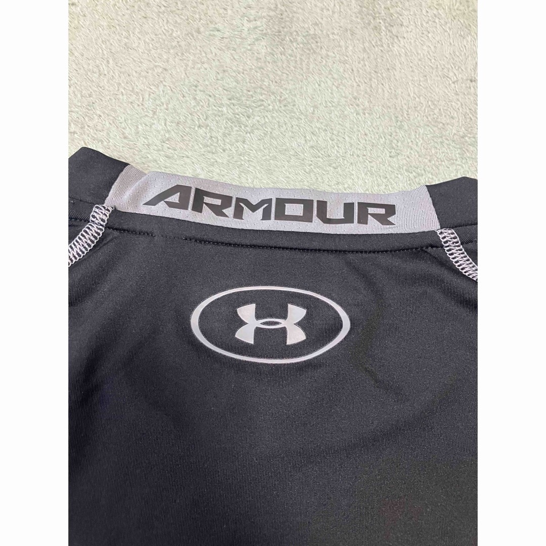 UNDER ARMOUR(アンダーアーマー)のアンダーアーマー  ヒートギア　コンプレショッンシャツ　黒 メンズのトップス(Tシャツ/カットソー(半袖/袖なし))の商品写真