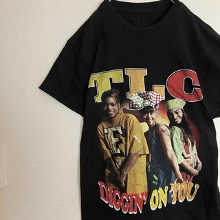 ミュージックティー(MUSIC TEE)のTLCティーエルシーR&BバンドTシャツtシャツバンTバンtビッグロゴ人物古着黒(Tシャツ/カットソー(半袖/袖なし))