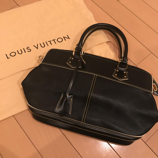 新作入荷!!】 VUITTON LOUIS - VUITTONスハリロックイットPMバッグ 星