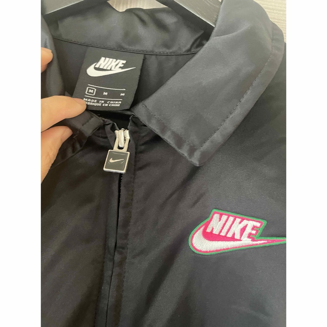 NIKE(ナイキ)のNIKE ロングコーチジャケット レディースのジャケット/アウター(スプリングコート)の商品写真
