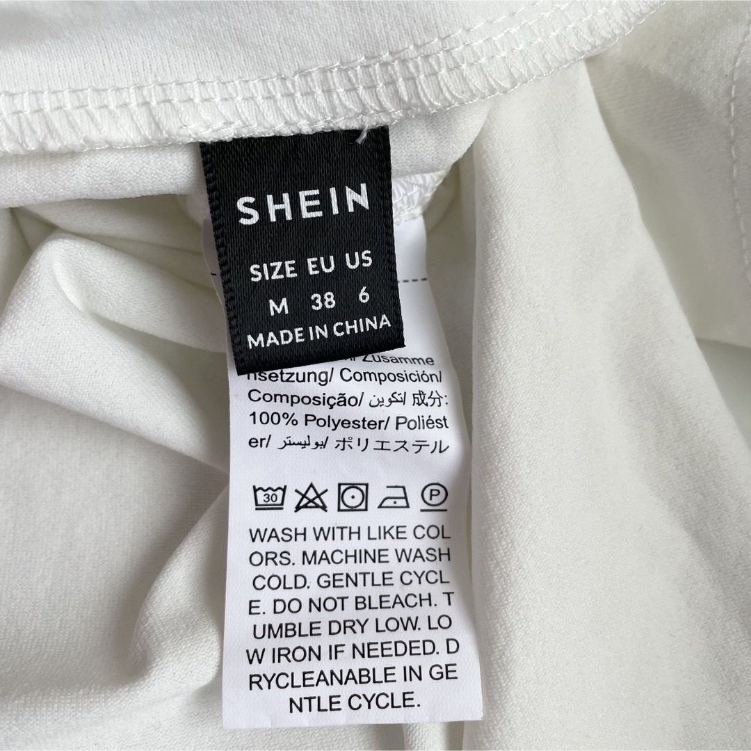 SHEIN(シーイン)の１回着　シーイン　裾フリンジ  カットソー レディースのトップス(カットソー(半袖/袖なし))の商品写真