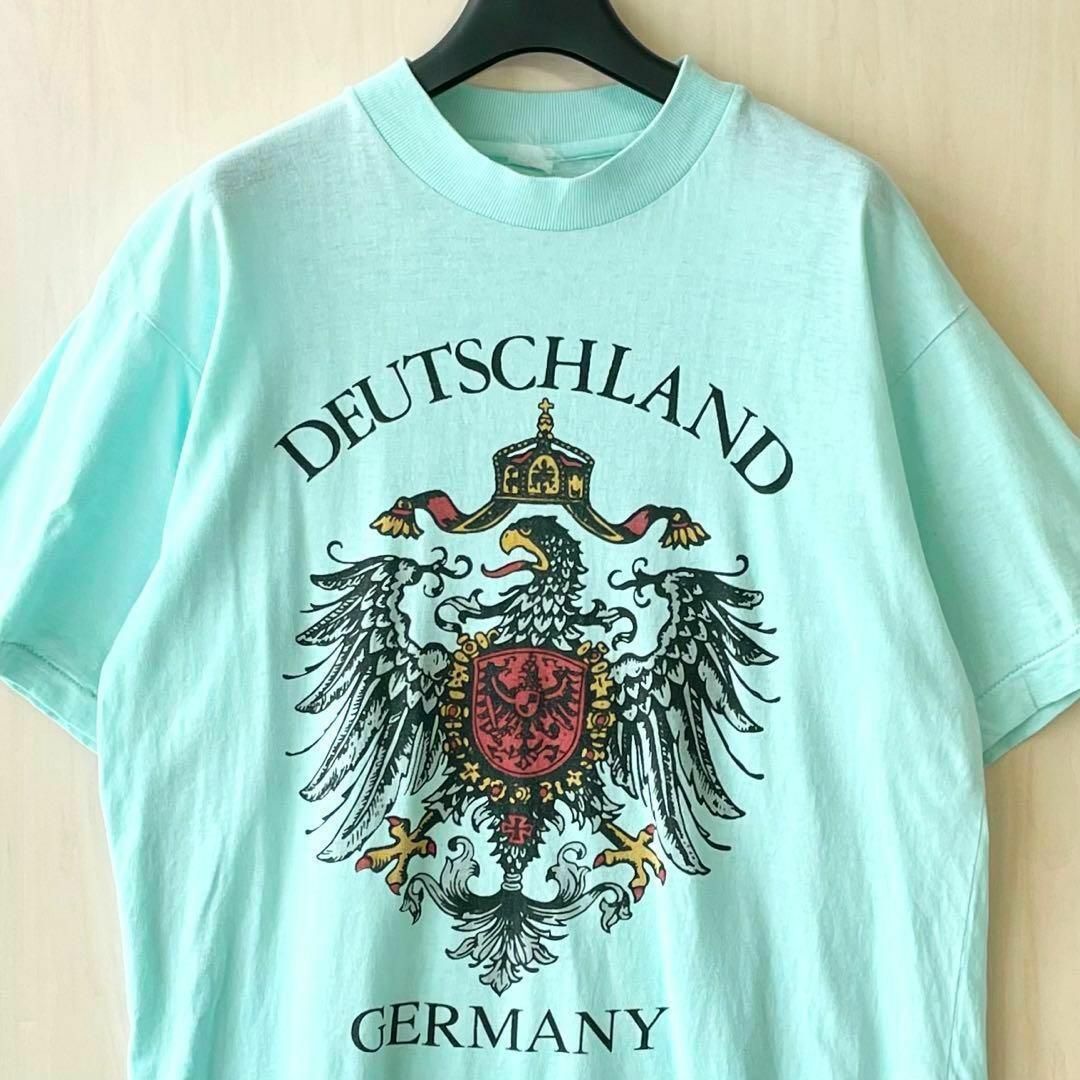 VINTAGE(ヴィンテージ)のヴィンテージ古着　ドイツ国章Tシャツ　　黒鷲　ライヒスアドラー　シングルステッチ メンズのトップス(Tシャツ/カットソー(半袖/袖なし))の商品写真