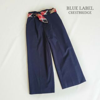 ブルーレーベルクレストブリッジ(BLUE LABEL CRESTBRIDGE)のブルーレーベルクレストブリッジ タックアンクルパンツ ベルト付き 38 ワイド(クロップドパンツ)