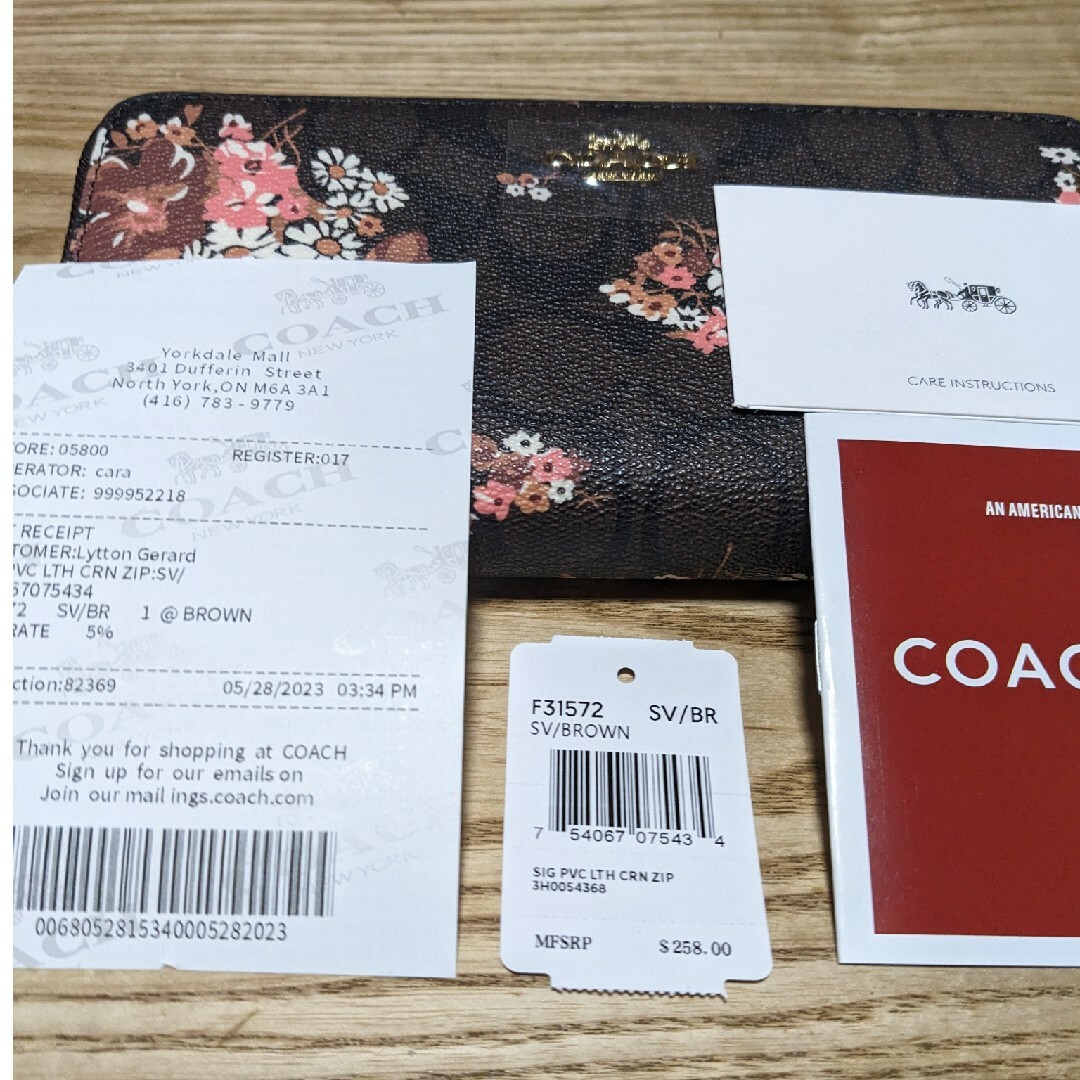 COACH(コーチ)のCOACH 長財布　黒系シグネチャー花柄模様 レディースのファッション小物(財布)の商品写真