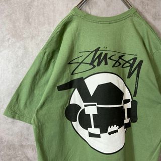 ステューシー(STUSSY)の【サーフマン、バックプリント】stussyくすみグリーン古着Tシャツ緑sk8L(Tシャツ/カットソー(半袖/袖なし))