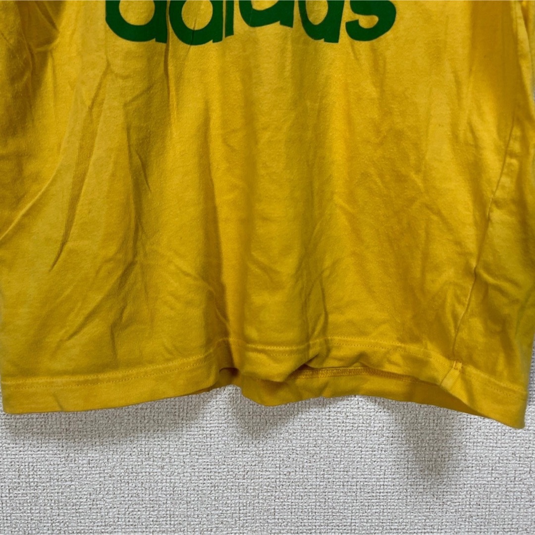 adidas(アディダス)の【アディダス】半袖Tシャツ　トレフォイルロゴ　デカロゴ　イエロー　ブラジル74 メンズのトップス(Tシャツ/カットソー(半袖/袖なし))の商品写真