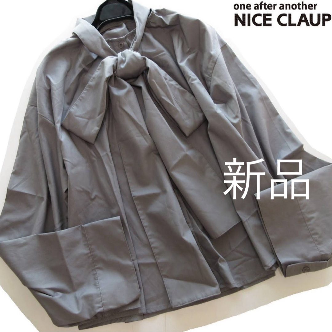 one after another NICE CLAUP(ワンアフターアナザーナイスクラップ)の新品NICE CLAUP ビッグリボンワイドスリーブゆるブラウス/GR レディースのトップス(シャツ/ブラウス(長袖/七分))の商品写真