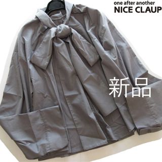 ワンアフターアナザーナイスクラップ(one after another NICE CLAUP)の新品NICE CLAUP ビッグリボンワイドスリーブゆるブラウス/GR(シャツ/ブラウス(長袖/七分))