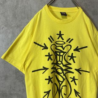 ステューシー(STUSSY)の【メキシコ製、光化学】stussy両面プリントロゴ古着ストリート黄　L 00s(Tシャツ/カットソー(半袖/袖なし))