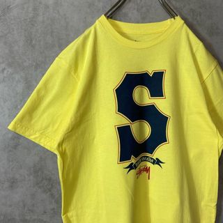 ステューシー(STUSSY)の【ビッグロゴTシャツ、ナンバリング】stussy古着Tシャツ黄色ストリートM(Tシャツ/カットソー(半袖/袖なし))