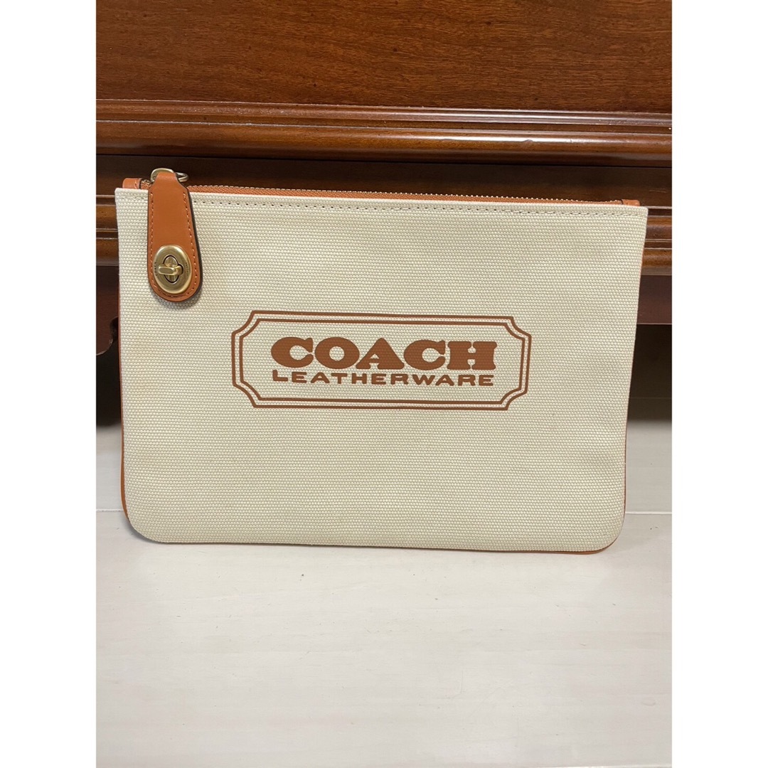 COACH(コーチ)のコーチ クラッチバッグ CD699G アイボリー ブラウン キャンバス レザー レディースのファッション小物(ポーチ)の商品写真