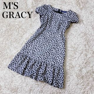 エムズグレイシー(M'S GRACY)のエムズグレイシー 花柄 ひざ丈 ワンピース フレンチスリーブ プリーツバルーン(ひざ丈ワンピース)