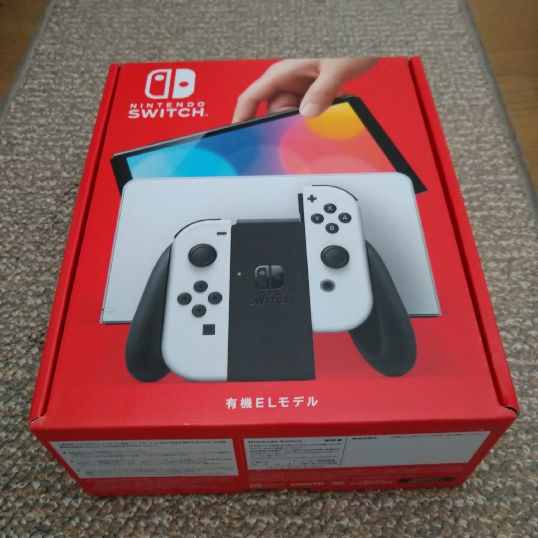 Nintendo Switch(ニンテンドースイッチ)の(保証書欄印なし)スイッチ本体有機ELホワイト★新品未開封★匿名送料無料★ エンタメ/ホビーのゲームソフト/ゲーム機本体(家庭用ゲーム機本体)の商品写真