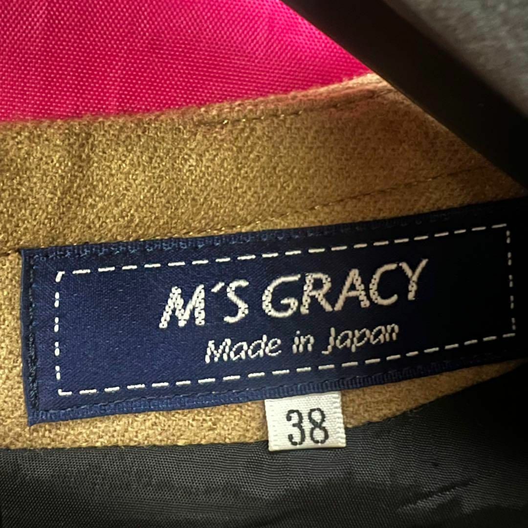 M'S GRACY(エムズグレイシー)の【美品】M'S GRACY 膝丈ワンピース フレア ブラック リボン 38 レディースのワンピース(ひざ丈ワンピース)の商品写真