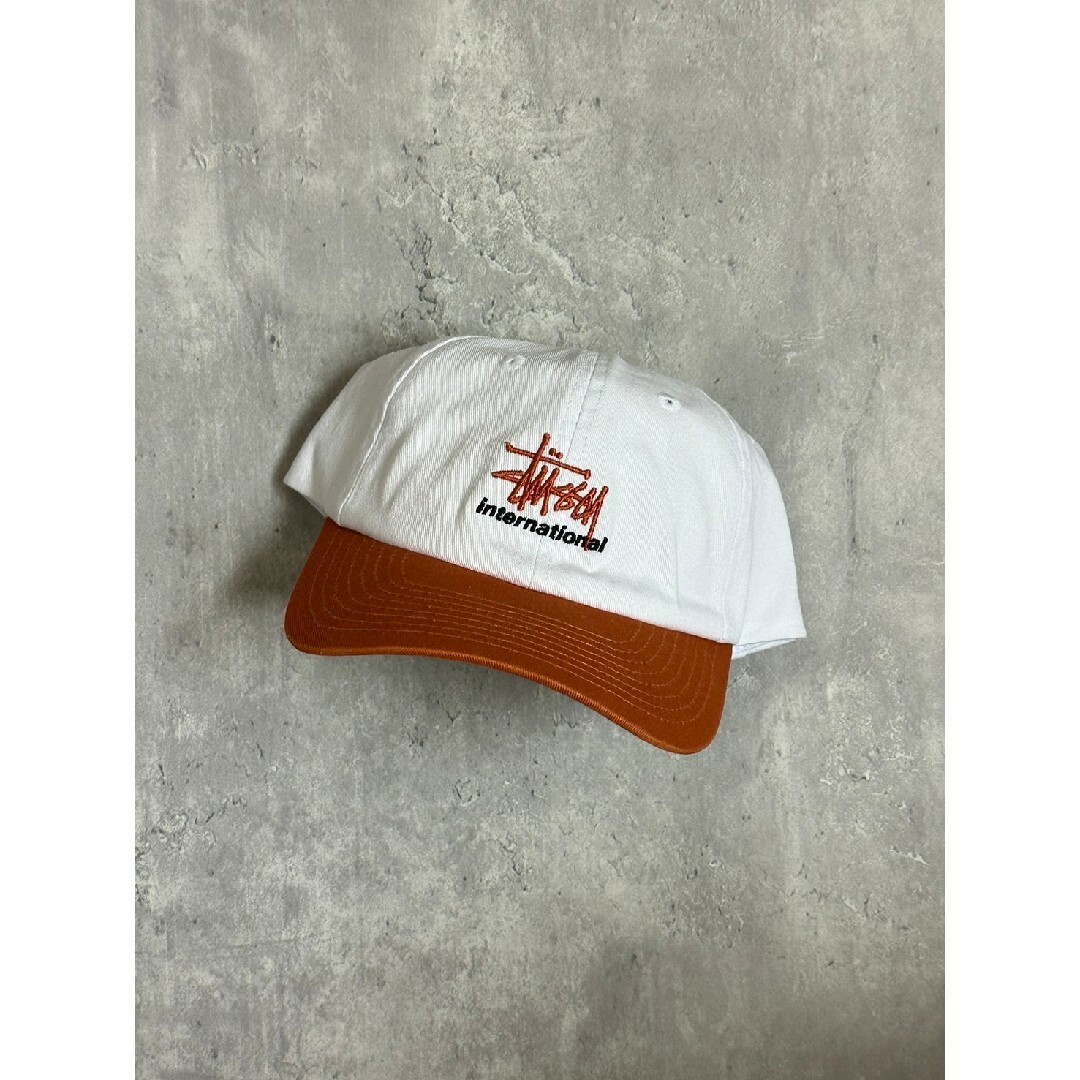 STUSSY(ステューシー)のステューシー グラフィックロゴ インターナショナル スナップバックキャップ メンズの帽子(キャップ)の商品写真