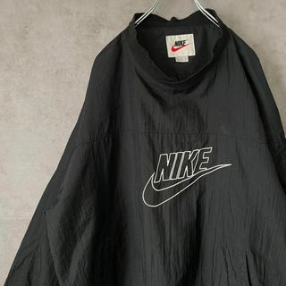 ナイキ(NIKE)の【usa製、ビッグ刺繍ロゴ】NIKEナイロンジャケット古着スウッシュ黒90s(ナイロンジャケット)