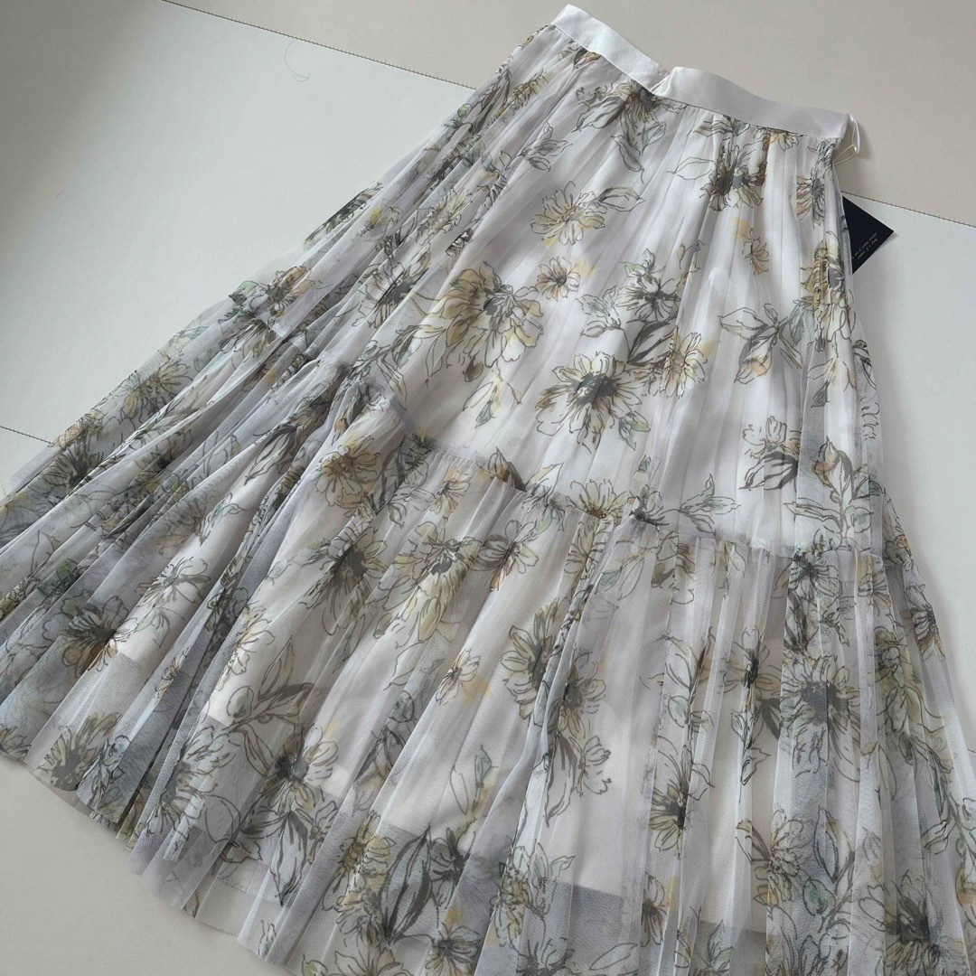 JUSGLITTY(ジャスグリッティー)のニュアンスフラワープリーツスカート レディースのスカート(ロングスカート)の商品写真