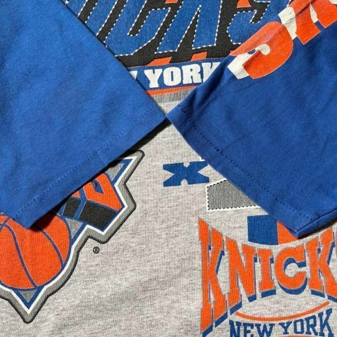 【NBA】90sNewYorkNicksニューヨークニックスラグラン　ストリート メンズのトップス(Tシャツ/カットソー(七分/長袖))の商品写真