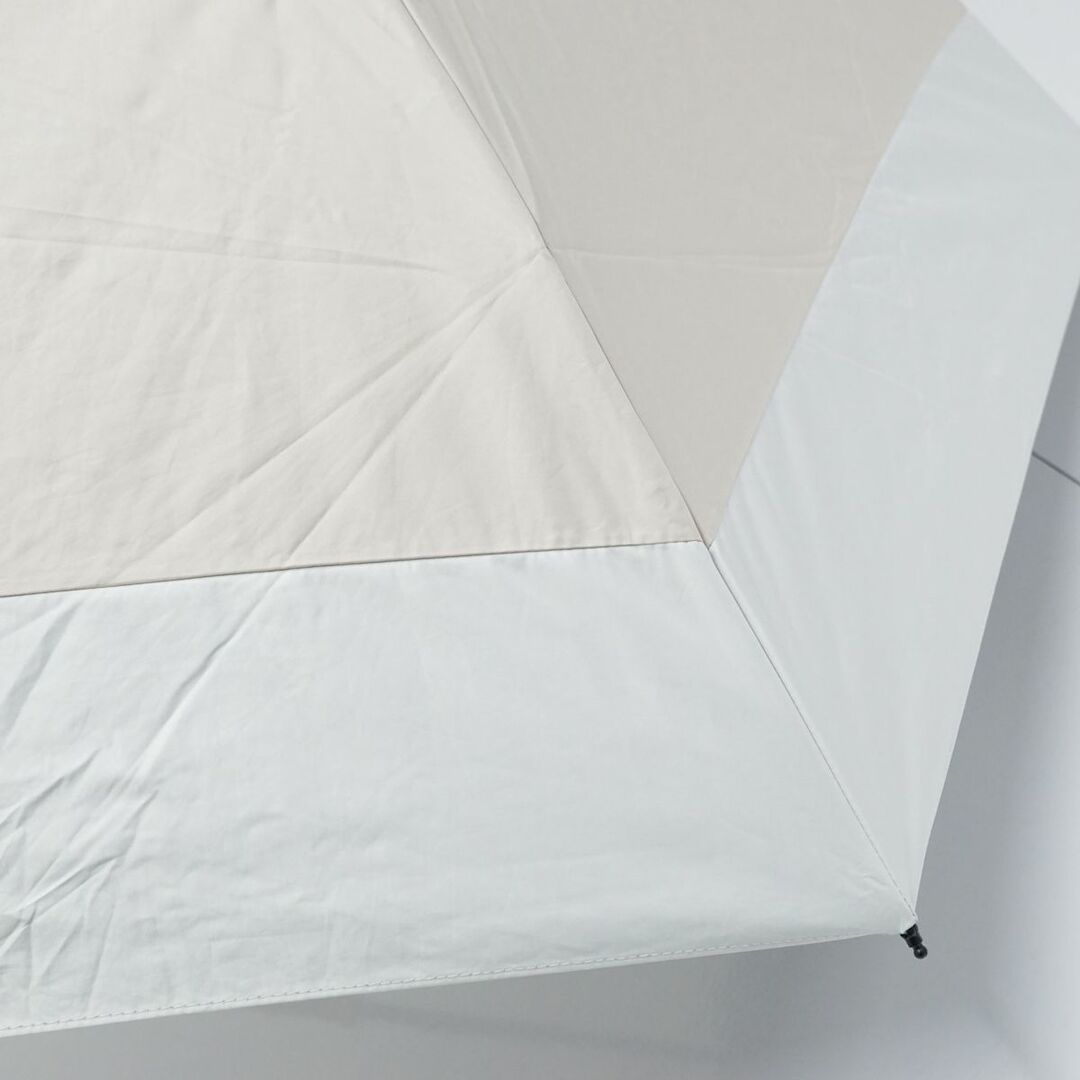 Wpc.(ダブルピーシー)の完全遮光折りたたみ日傘 Wpc. UVO ウーボ USED品 ベージュ 切り継ぎ 3段 UV 遮光 遮熱 最強の日傘 軽量 55cm FA8423 レディースのファッション小物(傘)の商品写真