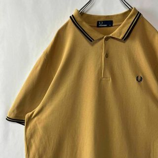 フレッドペリー(FRED PERRY)のフレッドペリー　ポロシャツ　ワンポイントロゴ　半袖シャツ　イエロー　古着　XL(ポロシャツ)