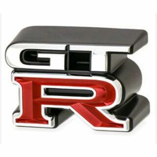 ニッサン(日産)の日産 純正 スカイライン GT-R R34 フロントグリルエンブレム(車種別パーツ)
