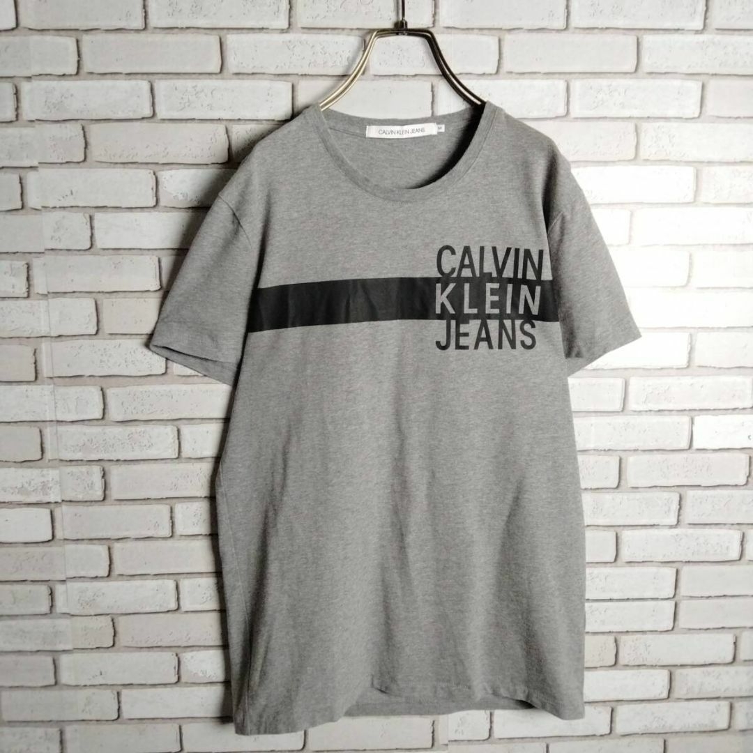Calvin Klein(カルバンクライン)のカルバンクラインジーンズ　Tシャツ　半袖　ビッグロゴ　プリント　グレー メンズのトップス(Tシャツ/カットソー(半袖/袖なし))の商品写真