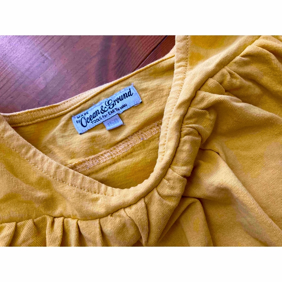 OCEAN&GROUND(オーシャンアンドグラウンド)の⭐︎美品⭐︎女の子⭐︎Ocean and ground   マスタード色　肩出し キッズ/ベビー/マタニティのキッズ服女の子用(90cm~)(Tシャツ/カットソー)の商品写真