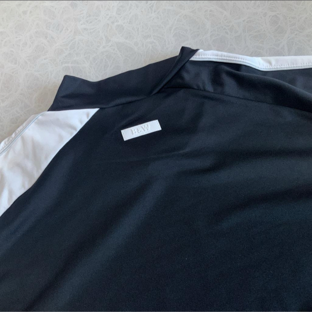 Black & White Sportswear(ブラックアンドホワイトスポーツウェア)のBLACK&WHITE【LL】スムースモック UVプロテクト 吸汗速乾（黒） スポーツ/アウトドアのゴルフ(ウエア)の商品写真