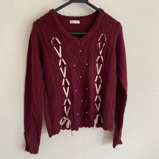 axes femme ボルドーのリボンニット