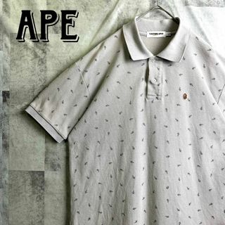 アベイシングエイプ(A BATHING APE)の美品 アベイシングエイプ ポロシャツ スター総柄 サルロゴ グレー L(ポロシャツ)