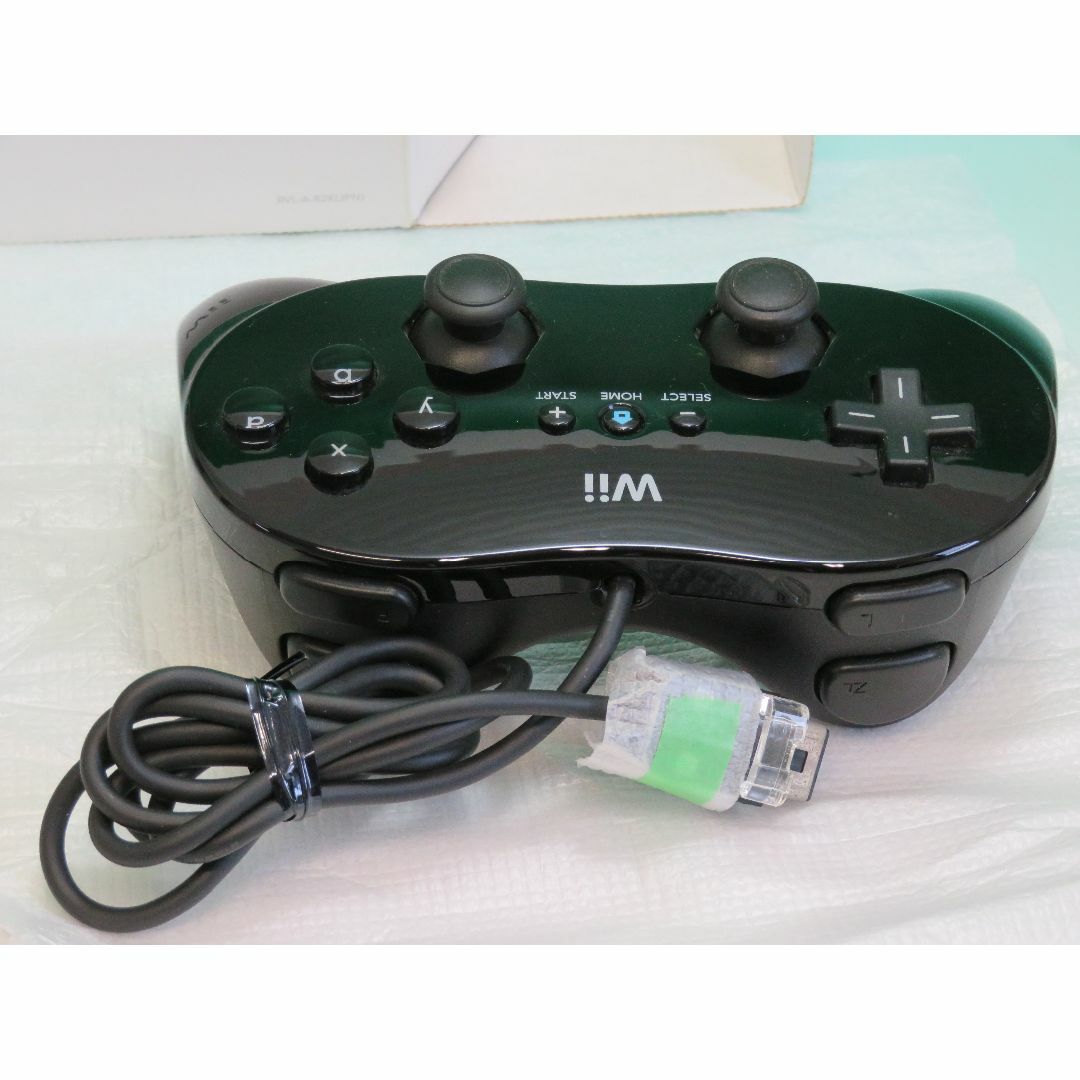 Wii(ウィー)のWii クラシックコントローラー PRO クロ RVL-005-02 2009年 エンタメ/ホビーのゲームソフト/ゲーム機本体(その他)の商品写真