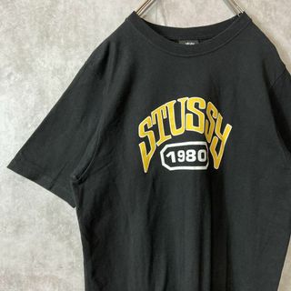 ステューシー(STUSSY)の【メキシコ製、アーチロゴ】stussy古着ストリート黒でかろごM 半袖野村周平(Tシャツ/カットソー(半袖/袖なし))